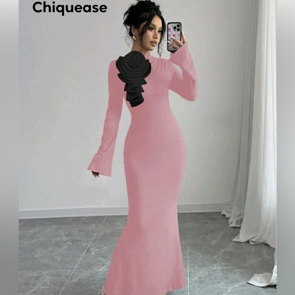 Elegant Pink Dress with Black Ruffle Accent